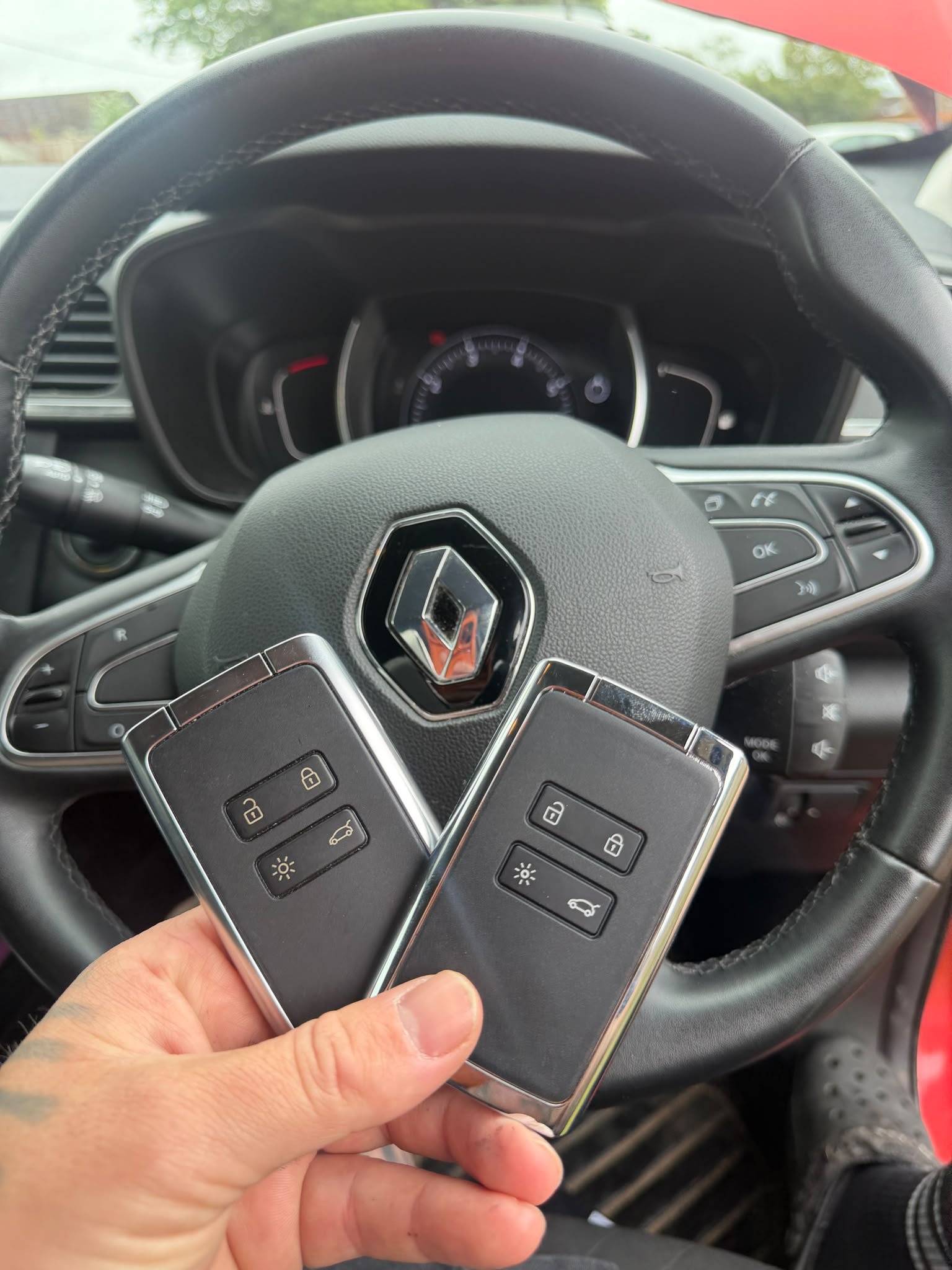 Two replacement Renault key cards cut and programmed by Lucky Lock Master